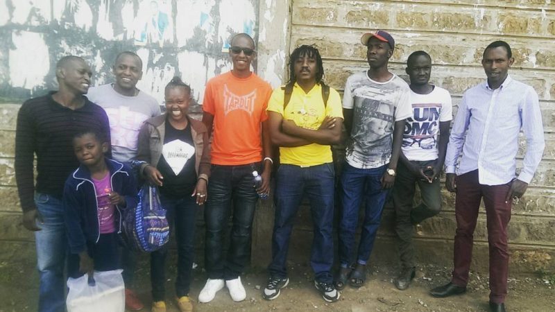 Titus Kuria with friends